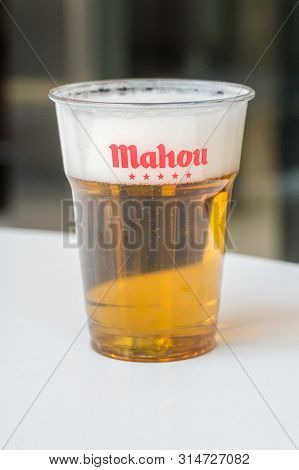 Andorra, Andorra - June 3, 2019: Cup Of Mahou Beer In Mcdonald Restaurant.