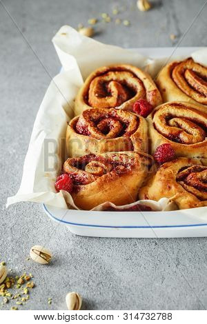 Cinnabon Buns. Sinabon Rolls With Cream Cheese, Cream And Brown Sugar On Grey Background. Cinnamon R