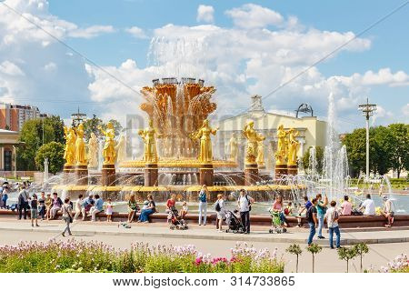 Moscow, Russia - July 22, 2019: People Near Fountain Friendship Of Peoples In Vdnh Park In Moscow At