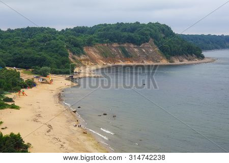 View Of The Cliffs, Sandy Beach And A Beautiful Cove On The Baltic Sea.