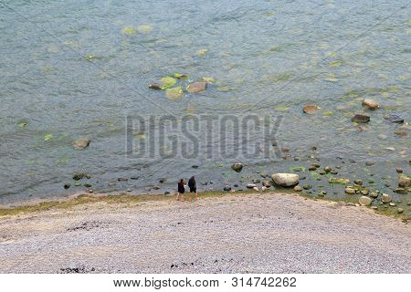 Aerial View Of A Beach On The Baltic Sea With The Prople On The Coast.