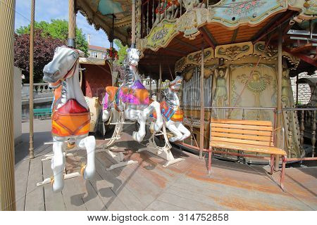 Paris France - May 24, 2019: Old Merry Go Round Amusement Park In Willette Square Park Montmartre Pa