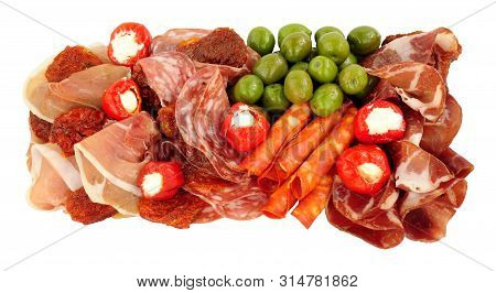 Gran Antipasto Snack Selection With Salami And Cured Meat Slices Isolated On A White Background