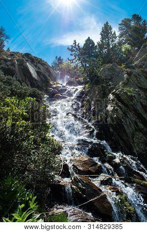 Landscape With Waterfall In The Mountains In Summer At Parc Natural Del Comapedrosa, Arinsal, Andorr