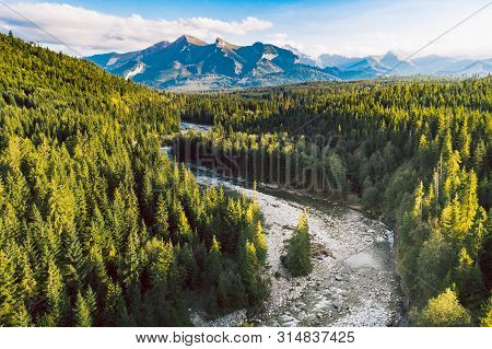 The Bialka River With Tatra Mountains In The Background