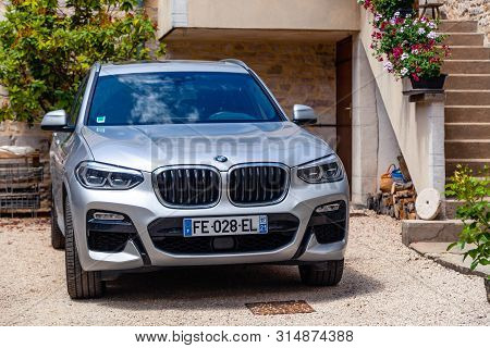 France Lyon 2019-06-20 Closeup Luxury Silver German Car Jeep Premium Bmw X4 With Eu Registration Num