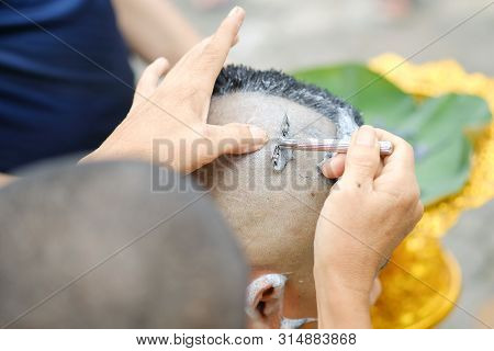 Closeup Shot Of Shaved Hair For Ordained Buddhist Man. Ordain Into Monkhood, Thailand