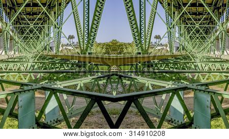 Panorama Symmetrical Design Created From Doubling A Photo Of A Green Bridge In California