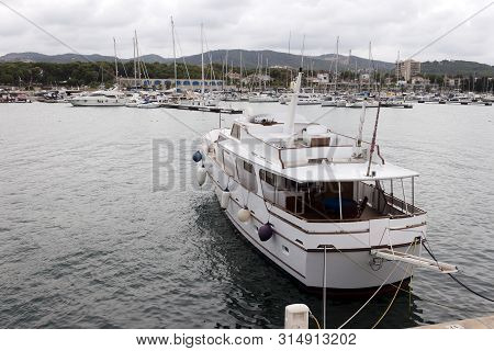 Recreational Yacht  Moored In The Pier In Roc De Sant Gaieta, Tarragona, Spain.