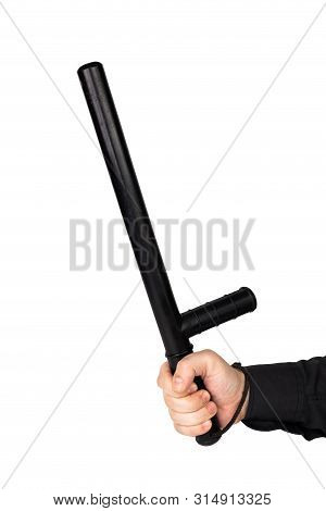 Hand In Black Shirt With Black Rubber Police Baton Isolated On White Background