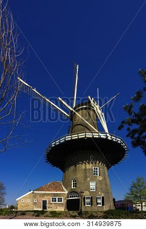 Leiden, Holland, Netherlands, April 21, 2019.  Street View, Molen De Valk Museum (falcon Windmill) T