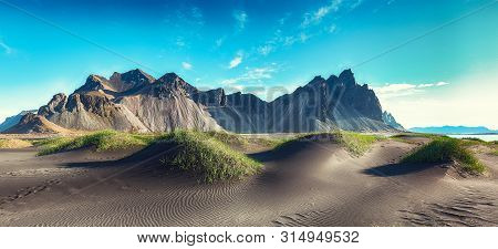 Fantastic Sunny Day And Gorgeous Black Sand Dunes On Stokksnes Cape In Iceland. Location: Stokksnes 