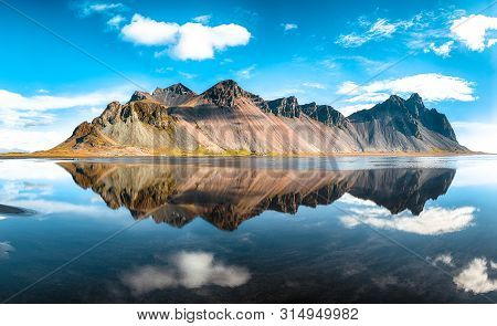 Splendid Sunny Day And Gorgeous Reflection Of Vestrahorn Mountaine On Stokksnes Cape In Iceland. Loc