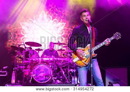 WANTAGH, NY - JUL 26: Nick Hexum of 311 performs in concert on July 26, 2019 at Northwell Health at Jones Beach Theater in Wantagh, New York. 