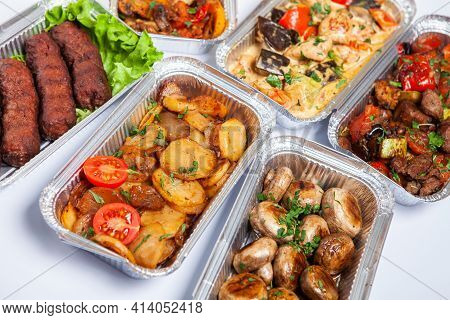 Business Lunch In Eco Plastic Container Ready For Delivery.top View. Office Lunch Boxes With Food Re