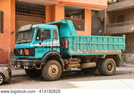 Giza, Egypt - January 26, 2021: Green Dump Truck Mercedes-benz Sk 3838 In The City Street.