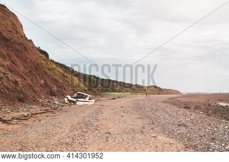 Sunset On Thurstaston Beach, Wirral Peninsula, Merseyside, England, Uk During Low Tide And Cloudy Da