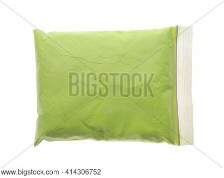 Light Green Powder In Plastic Bag Isolated On White, Top View. Holi Festival Celebration