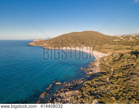 Aerial View On A Bright Sunny Day Of The Turquoise Mediterranean Sea At Bodri Beach And Rocky Coastl