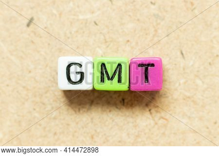 Color Alphabet Letter Block In Word Gmt (abbreviation Of Greenwich Mean Time) On Wood Background