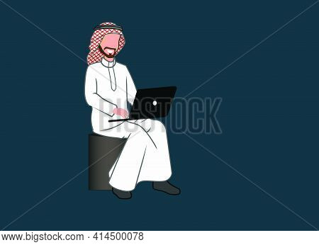 A Saudi Man Sitting With A Laptop And Working, A Corporate Saudi Man Working On Laptop