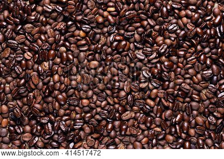 Roasted Ccoffee Beans Background. Arabic Roasting Coffee. Ingredient Of Hot Beverage.