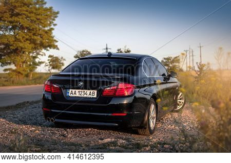 Kherson, Ukraine - June 2019. Bmw 5-series F10 In A Black Color.