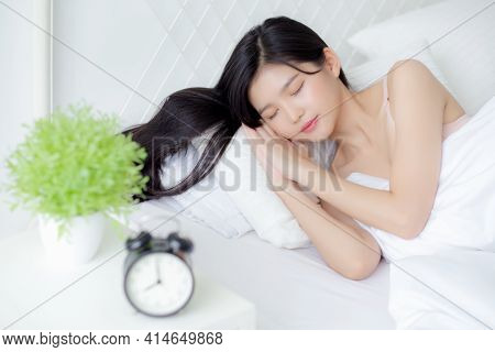 Beautiful Young Asian Woman Sleep With Relax On The Bed With Alarm Clock In The Morning, Girl Sleep 