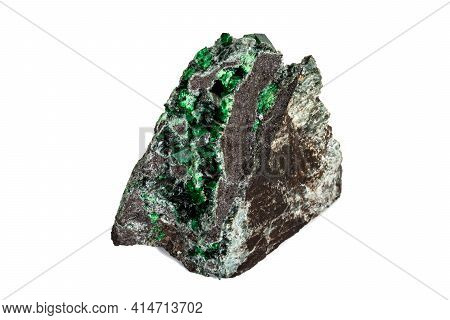Macro Stone Garnet Mineral, Uvarovite In Rock On A White Background