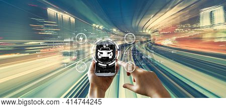 Ev Concept With Person Using A Smartphone Over Abstract High Speed Technology Pov Motion Blur
