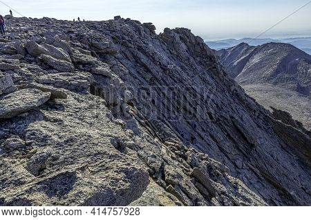 Climbers Making Their Way Up The Homestretch To The Summit Of Longs Peak