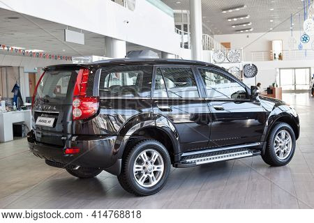 Russia, Izhevsk - February 17, 2021: Haval Showroom. New Modern Haval H5 Car In Dealer Showroom. Bac