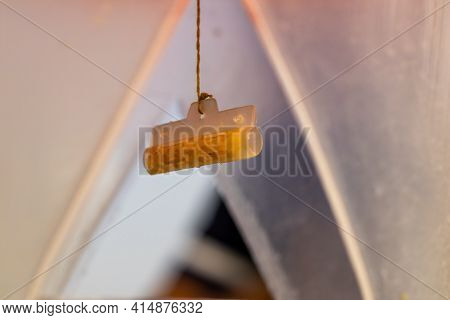 A Large Hole Was Made In The Middle Of A Plastic Jar And Poisonous Plants Were Hung Inside Because T