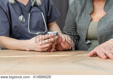 Medic And Patient Using Finger Pulse Oximeter