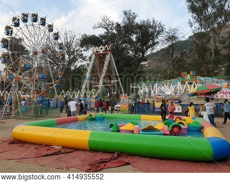 Mandi, Himachal Pradesh, India - 03 14 2021: People Enjoying Maha Shivaratri Carnival Fair (mela) Du