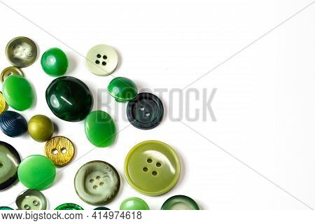 Colorful Green Buttons On A White Background. Lots Of Green Buttons. Old Vintage Buttons Close Up. C