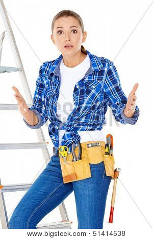 DIY handy woman at her wits end raising her palms in the air to indicate that she does know the answer or have a solution to the problem