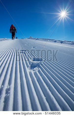 Skier Is Posing At Camera At Gudauri Resort In High Mountaing Of Georgia, Caucasus