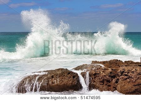Sea Wave Crashing On Rocks
