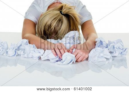 young woman in office is overwhelmed with work. burnout in work or study.