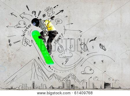 Close up of hand drawing sketches of snowboarder