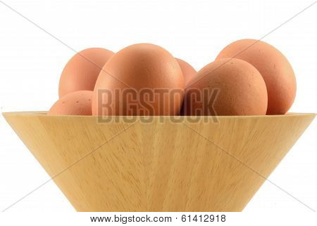 eggs on the wooden bowl