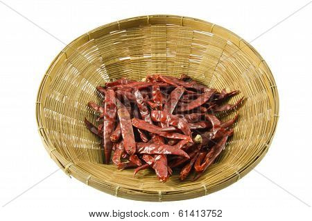 Group of red dry chili on wooden basket