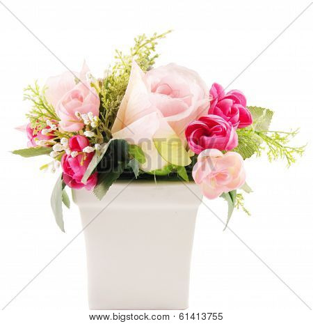 Pink flower in white vase