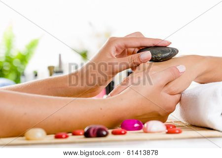 Close up of process of hand massage at beauty salon