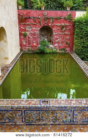 Green Pool Reflection Mosaic Wall Garden Alcazar Royal Palace Seville Spain