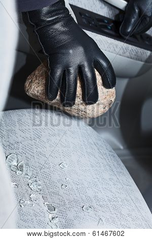 Hand With Stone