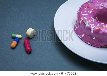 Various Medicines To Combat Diabetes Along With A Sweet Cake