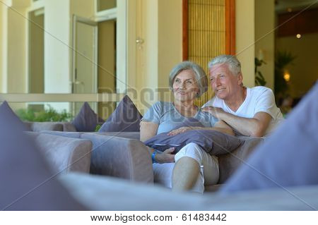 Charming old couple in hotel