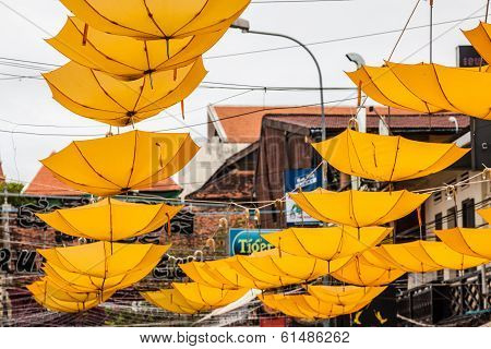 Street Decorated With Yellow Umbrellas